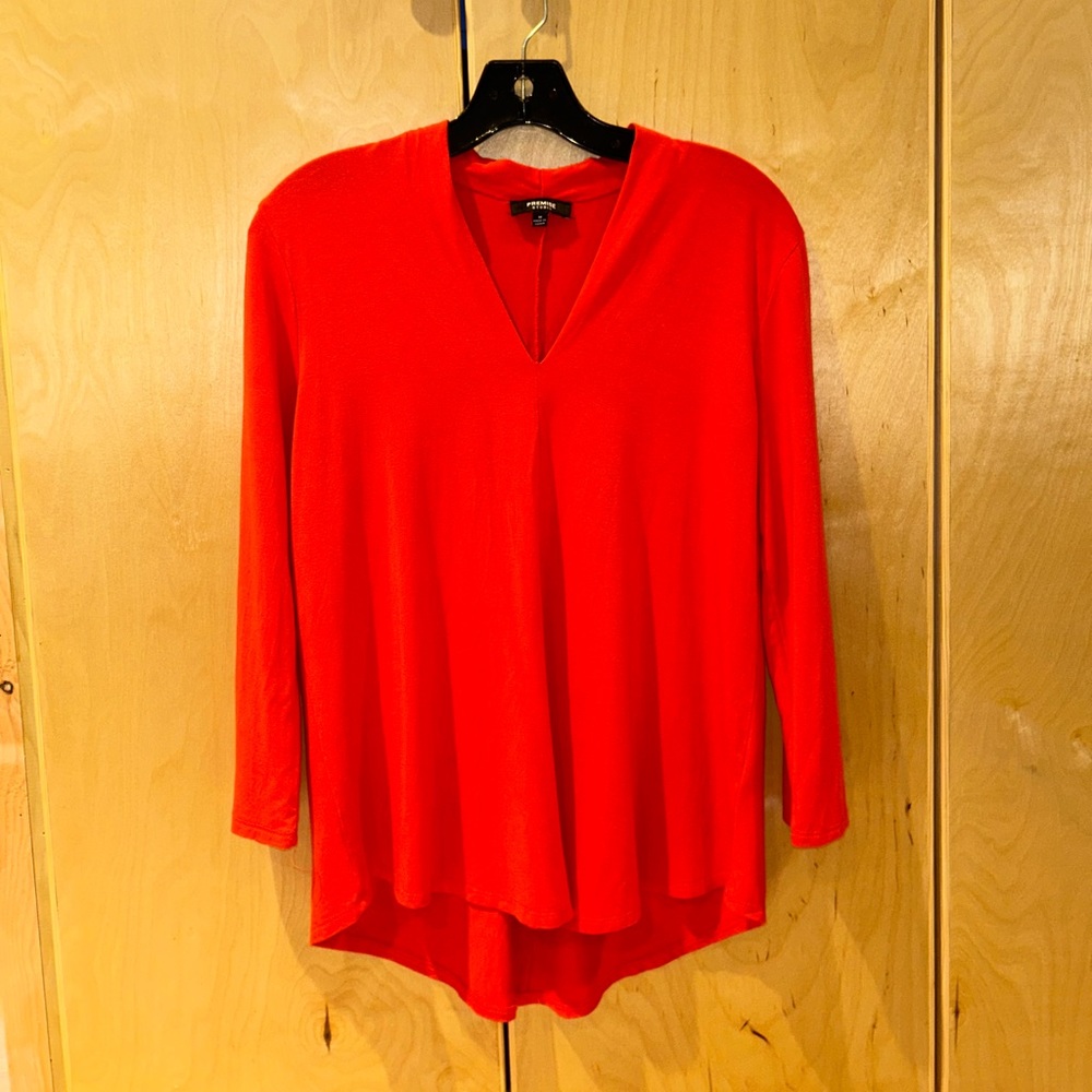 Orange Long Sleeve V Neck Top.